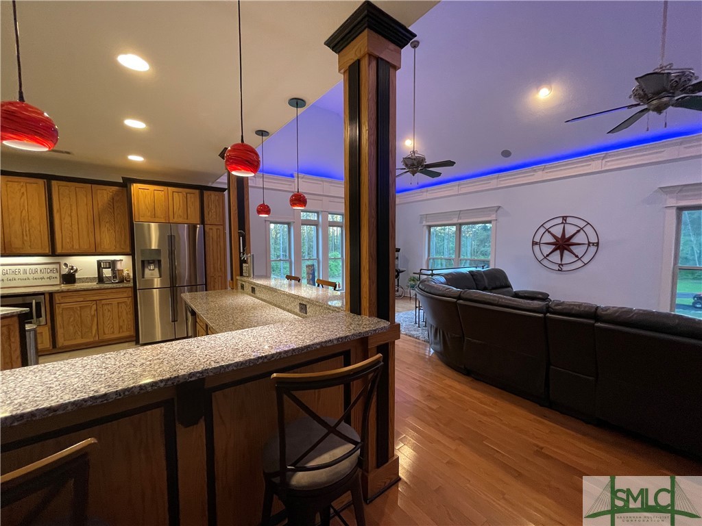 275 Kilkenny Road Richmond Hill, GA 31324 - Photo 7 of 50 Open kitchen / great room with LED lighting
