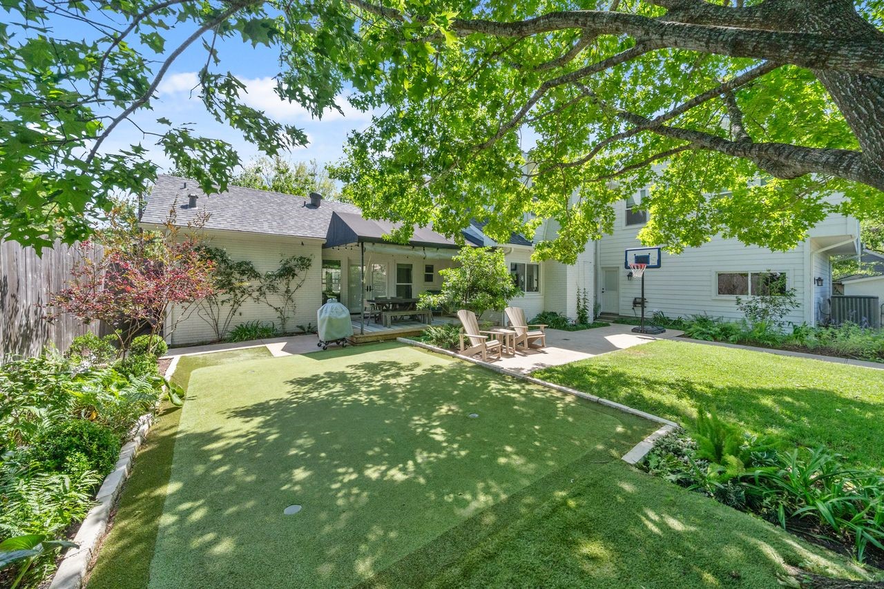 6510 Community Drive Houston, TX 77005 - Photo 6 of 37 Here is a different perspective of the putting green, chipping area, covered deck, and patio.