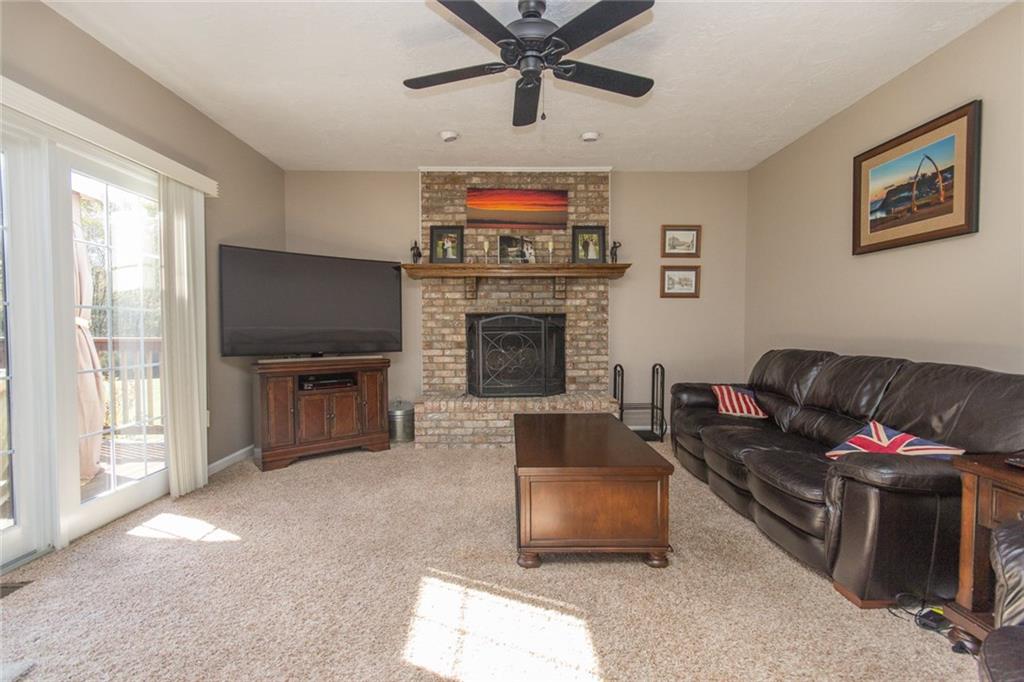 76 Firethorn Road Economy, PA 15005 - Photo 13 of 25 Good sized family room with gas fireplace.