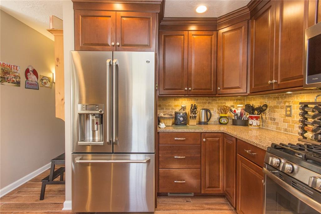 76 Firethorn Road Economy, PA 15005 - Photo 9 of 25 Stainless appliances. Refrigerator with built in Keurig.