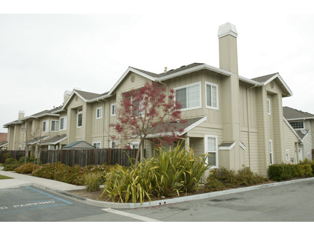 30 Chappel Loop Watsonville, CA 95019 - Photo 2 of 5 a front view of a house with a garden