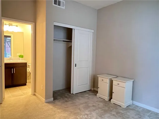 a view of a storage & utility room with a window