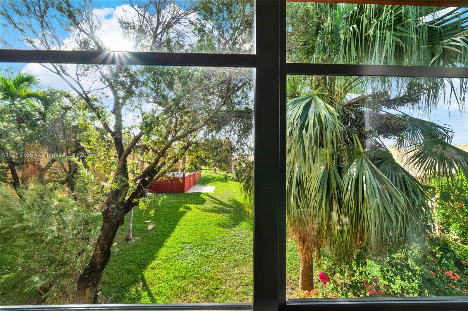 10857 Northwest 7th Street, Unit 2417 Miami, FL 33172 - Photo 24 of 35 a view of a yard with plants