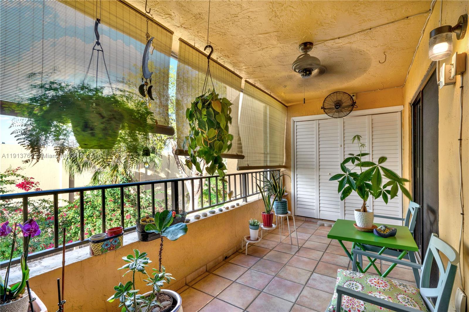10857 Northwest 7th Street, Unit 2417 Miami, FL 33172 - Photo 29 of 35 a view of a chairs on the deck