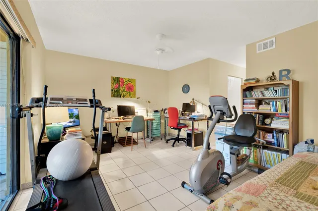 a view of a workspace with furniture and toys