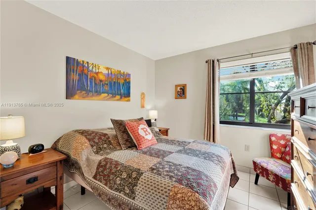 a bedroom with a bed and a closet