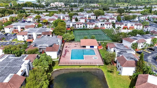 an aerial view of a house with a garden