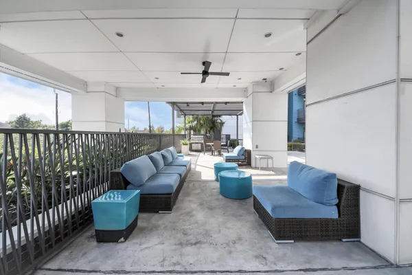 a kitchen with a sink appliances and cabinets