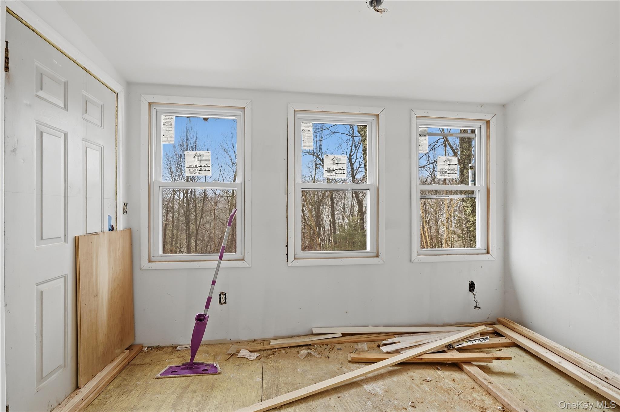 384 Tempaloni Road Ellenville, NY 12428 - Photo 14 of 18 a room with window and furniture