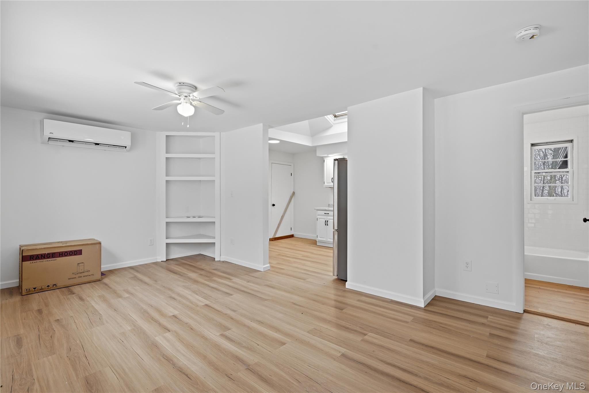 384 Tempaloni Road Ellenville, NY 12428 - Photo 10 of 18 a view of empty room with wooden floor