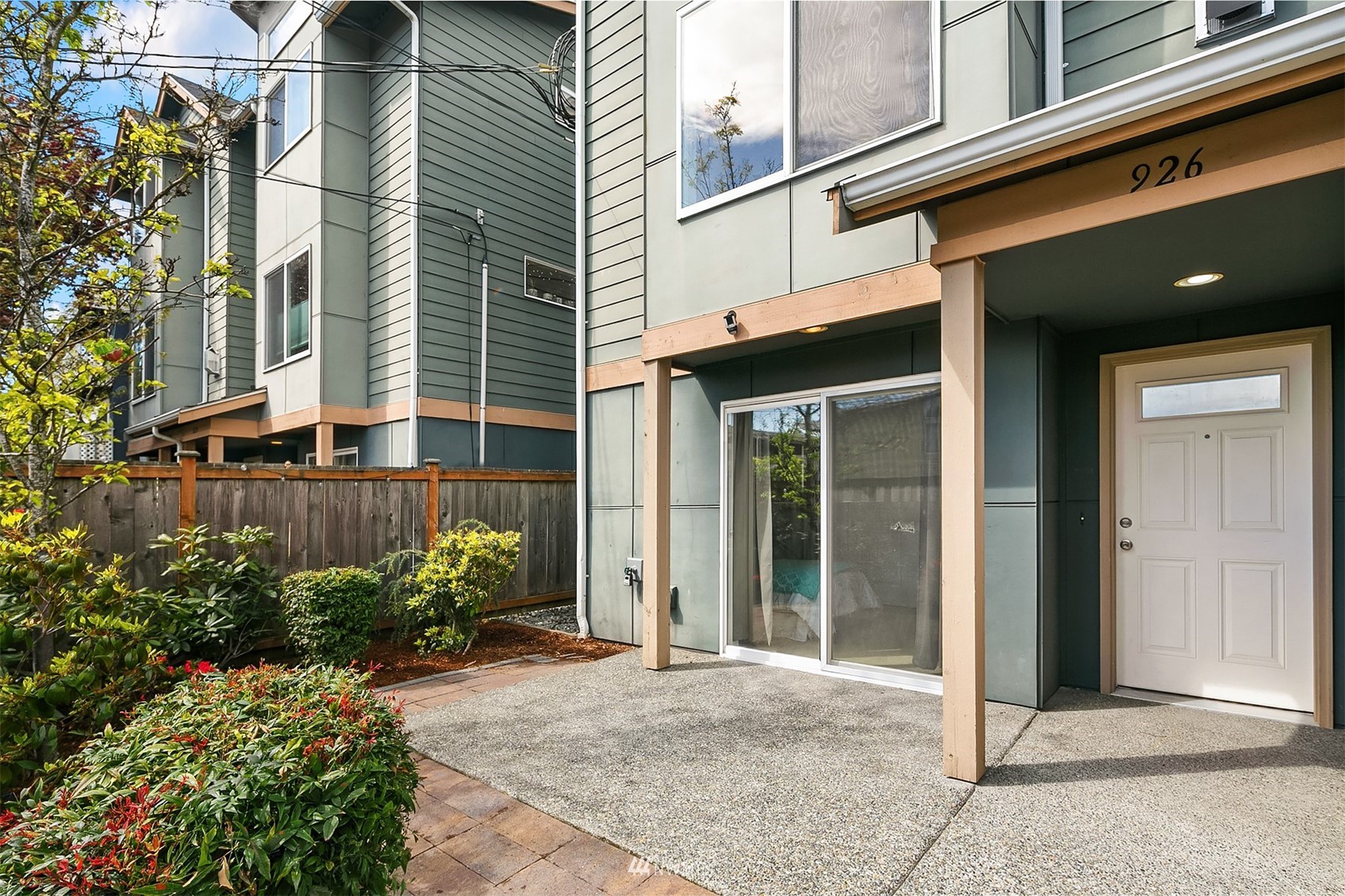 926 North 96th Street Seattle, WA 98103 - Photo 3 of 16 a view of a building with potted plants