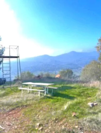 a view of a swimming pool with an outdoor space and seating area