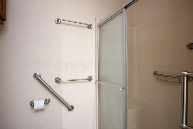 a close view of a shower in the bathroom