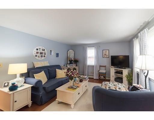 67 Folly Mill Road Salisbury, MA 01952 - Photo 18 of 28 a living room with furniture and a flat screen tv