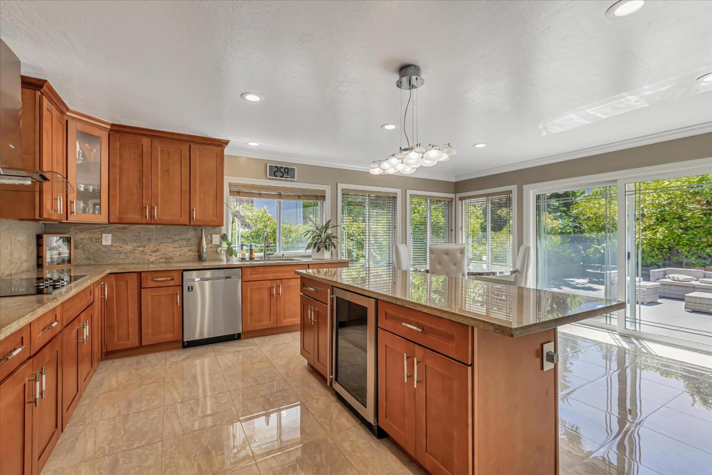 673 Timberpine Avenue Sunnyvale, CA 94086 - Photo 13 of 33 a kitchen with stainless steel appliances granite countertop sink stove and refrigerator