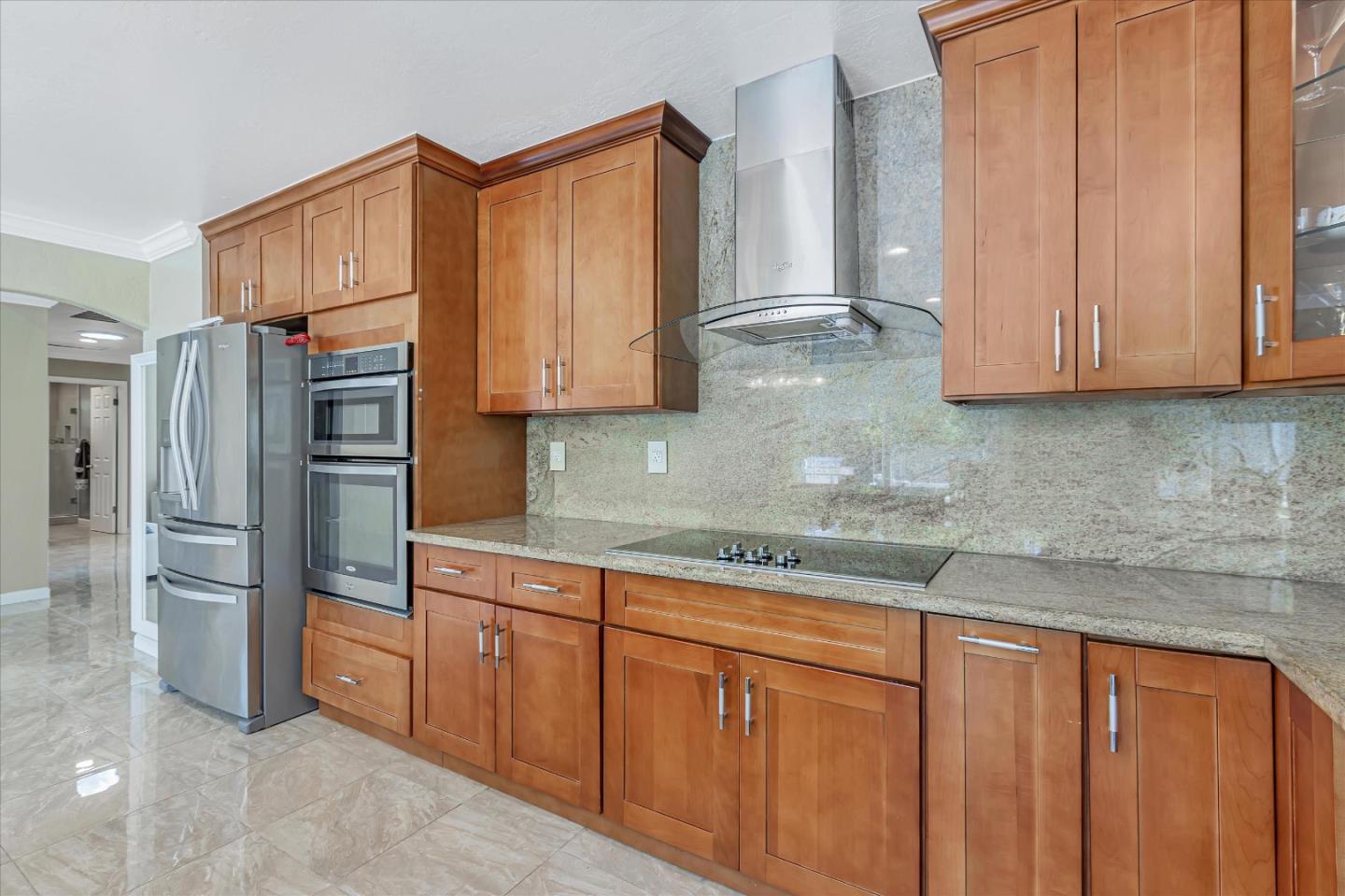 673 Timberpine Avenue Sunnyvale, CA 94086 - Photo 16 of 33 a kitchen with stainless steel appliances granite countertop a refrigerator and a sink