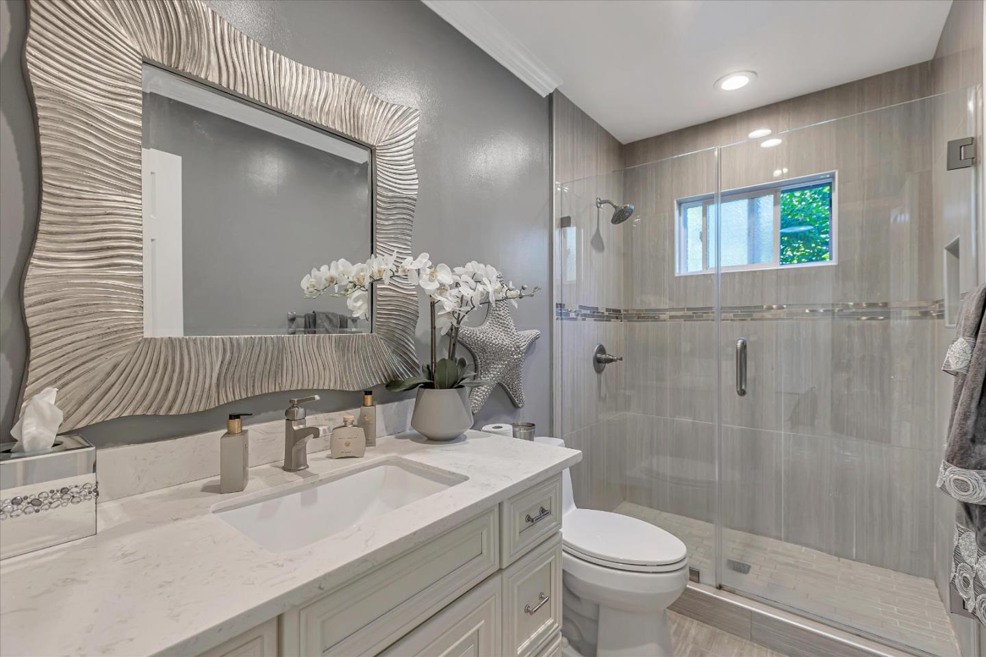 673 Timberpine Avenue Sunnyvale, CA 94086 - Photo 19 of 33 a bathroom with a sink toilet and shower
