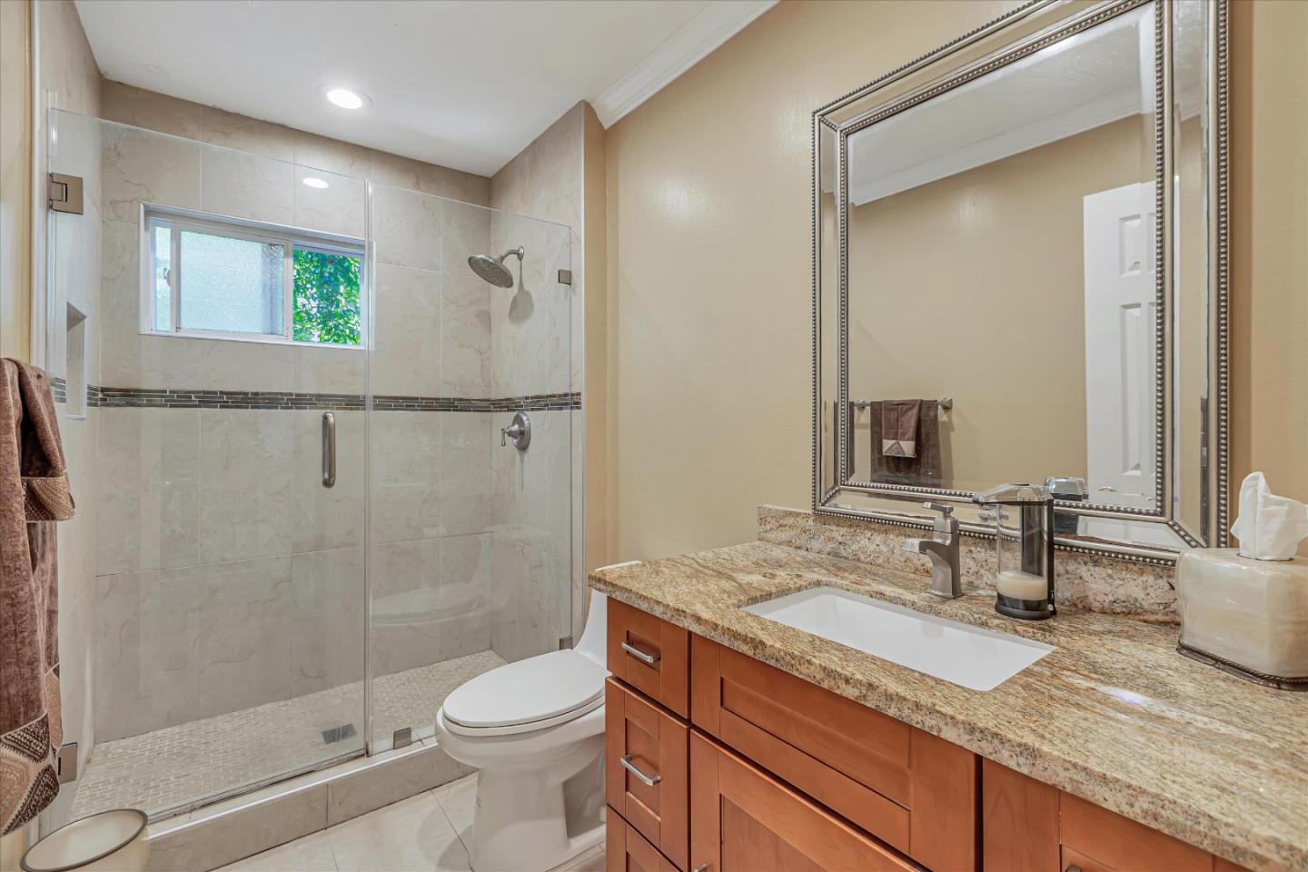 673 Timberpine Avenue Sunnyvale, CA 94086 - Photo 20 of 33 a bathroom with a granite countertop sink toilet and shower