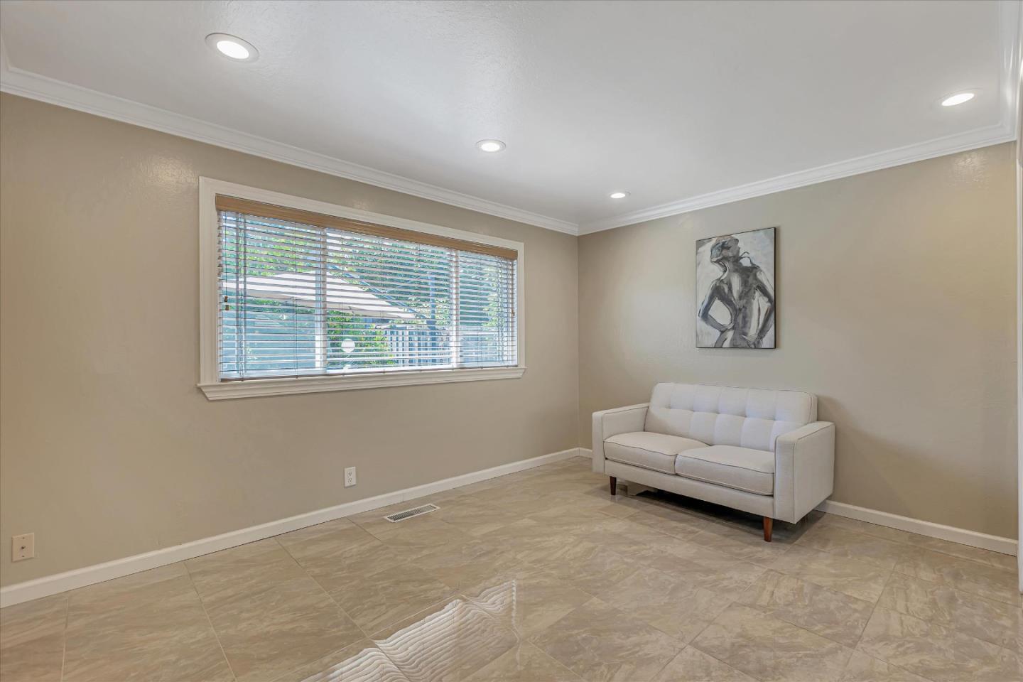 673 Timberpine Avenue Sunnyvale, CA 94086 - Photo 22 of 33 a living room with furniture and a window