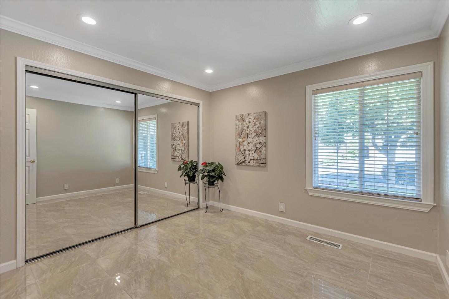 673 Timberpine Avenue Sunnyvale, CA 94086 - Photo 24 of 33 a bathroom with a glass shower door and a window