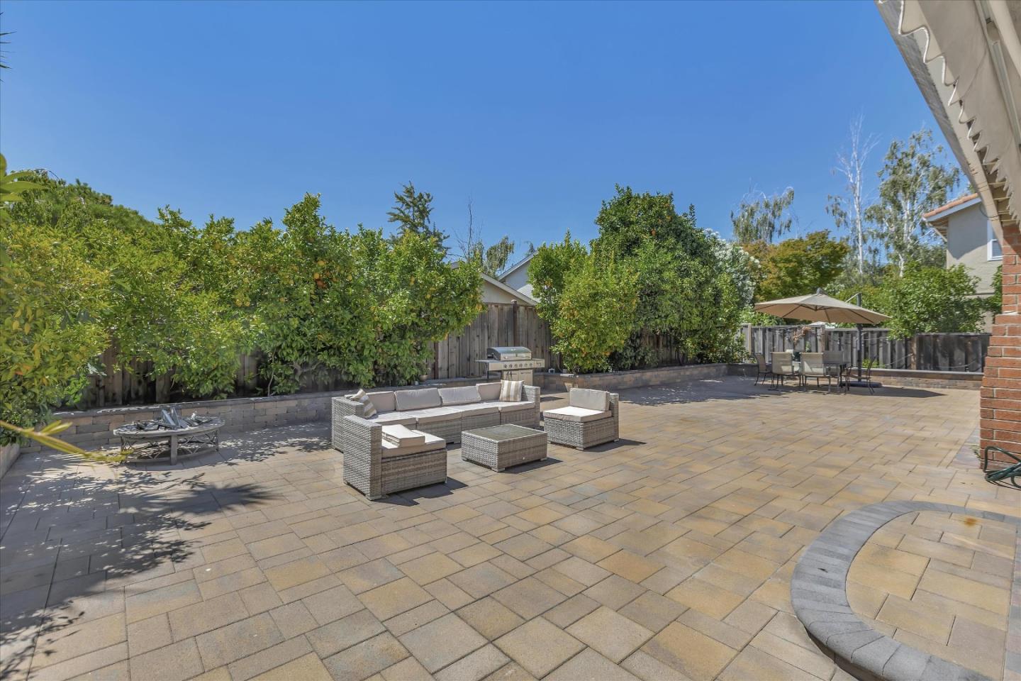 673 Timberpine Avenue Sunnyvale, CA 94086 - Photo 28 of 33 a view of a patio with table and chairs potted plants with sky view