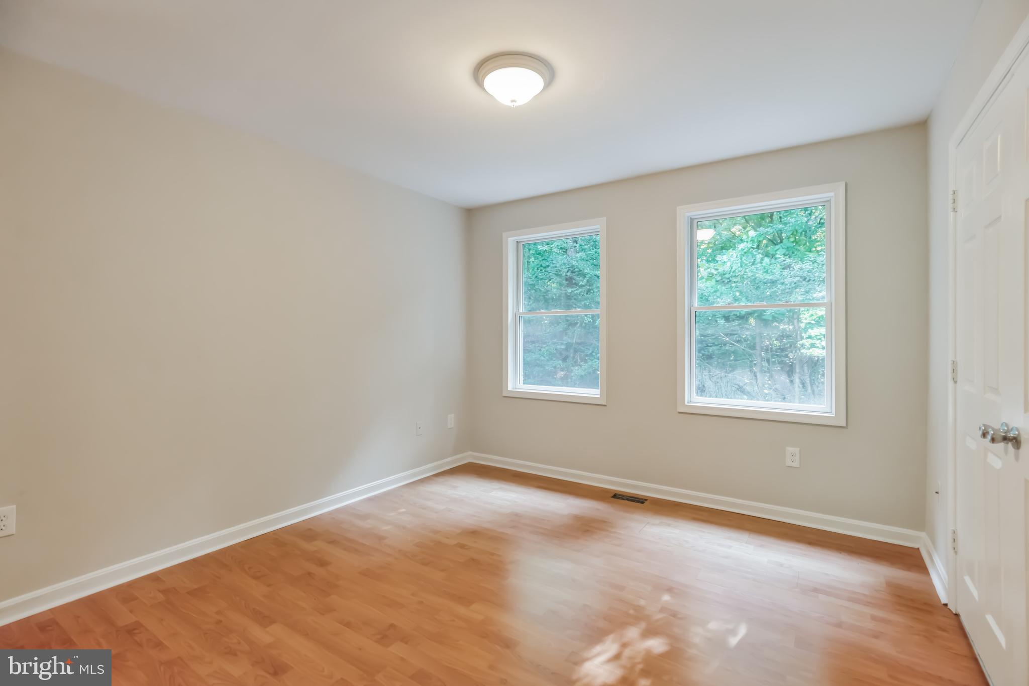 4365 Harvey Road Huntingtown, MD 20639 - Photo 21 of 36 an empty room with a window