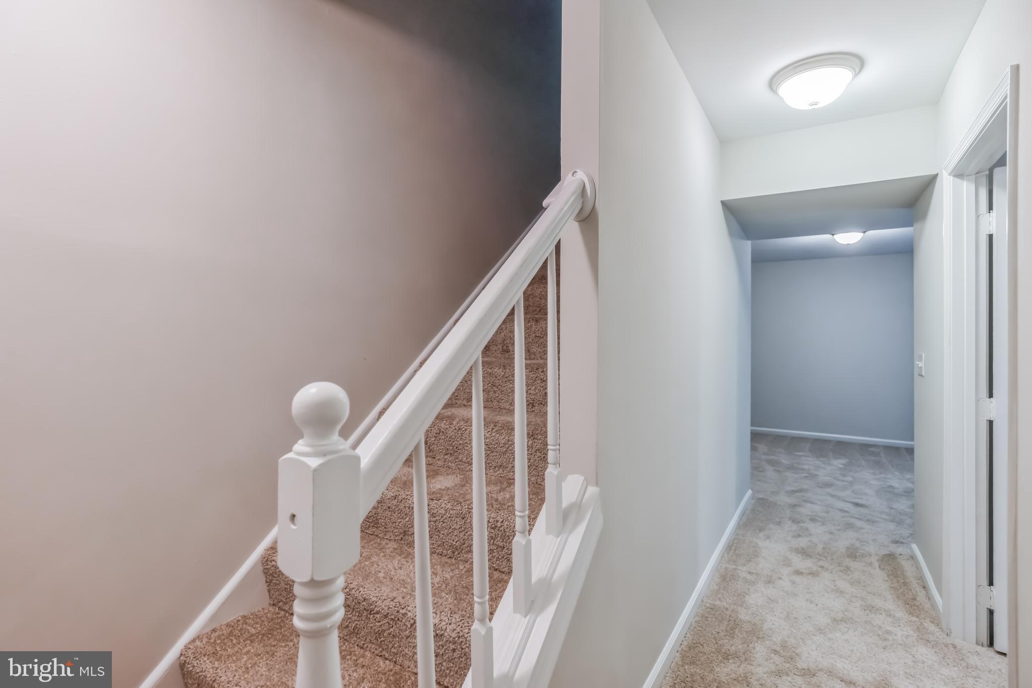 4365 Harvey Road Huntingtown, MD 20639 - Photo 30 of 36 a view of entryway with wooden floor