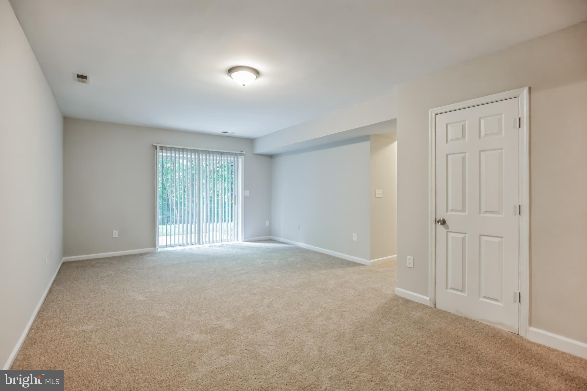 4365 Harvey Road Huntingtown, MD 20639 - Photo 34 of 36 a view of an empty room with a window