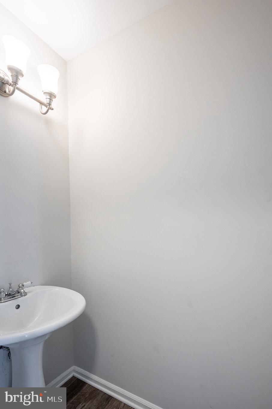 4365 Harvey Road Huntingtown, MD 20639 - Photo 36 of 36 a bathroom with a sink and a toilet