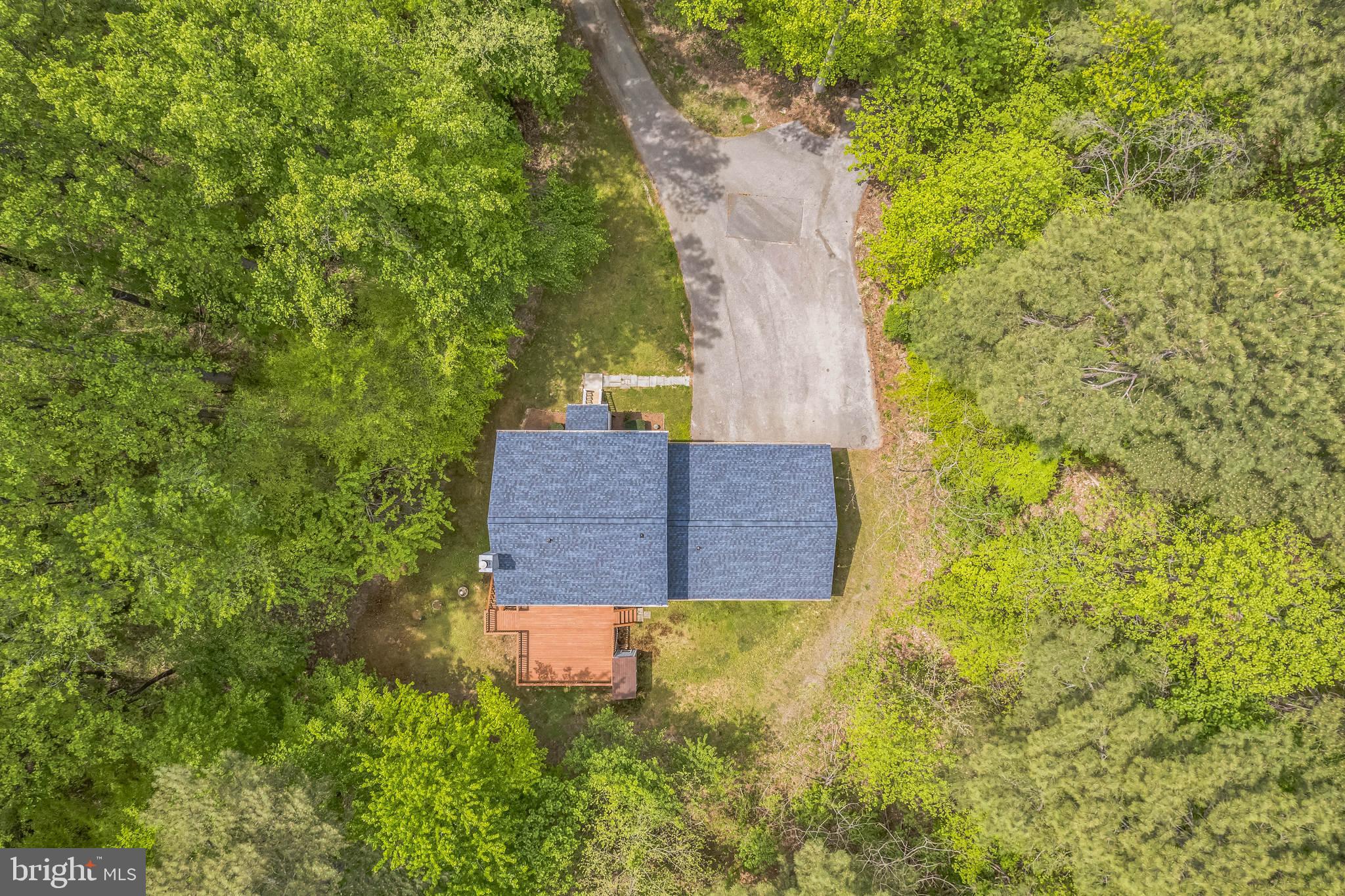 4365 Harvey Road Huntingtown, MD 20639 - Photo 4 of 36 a view of a back yard