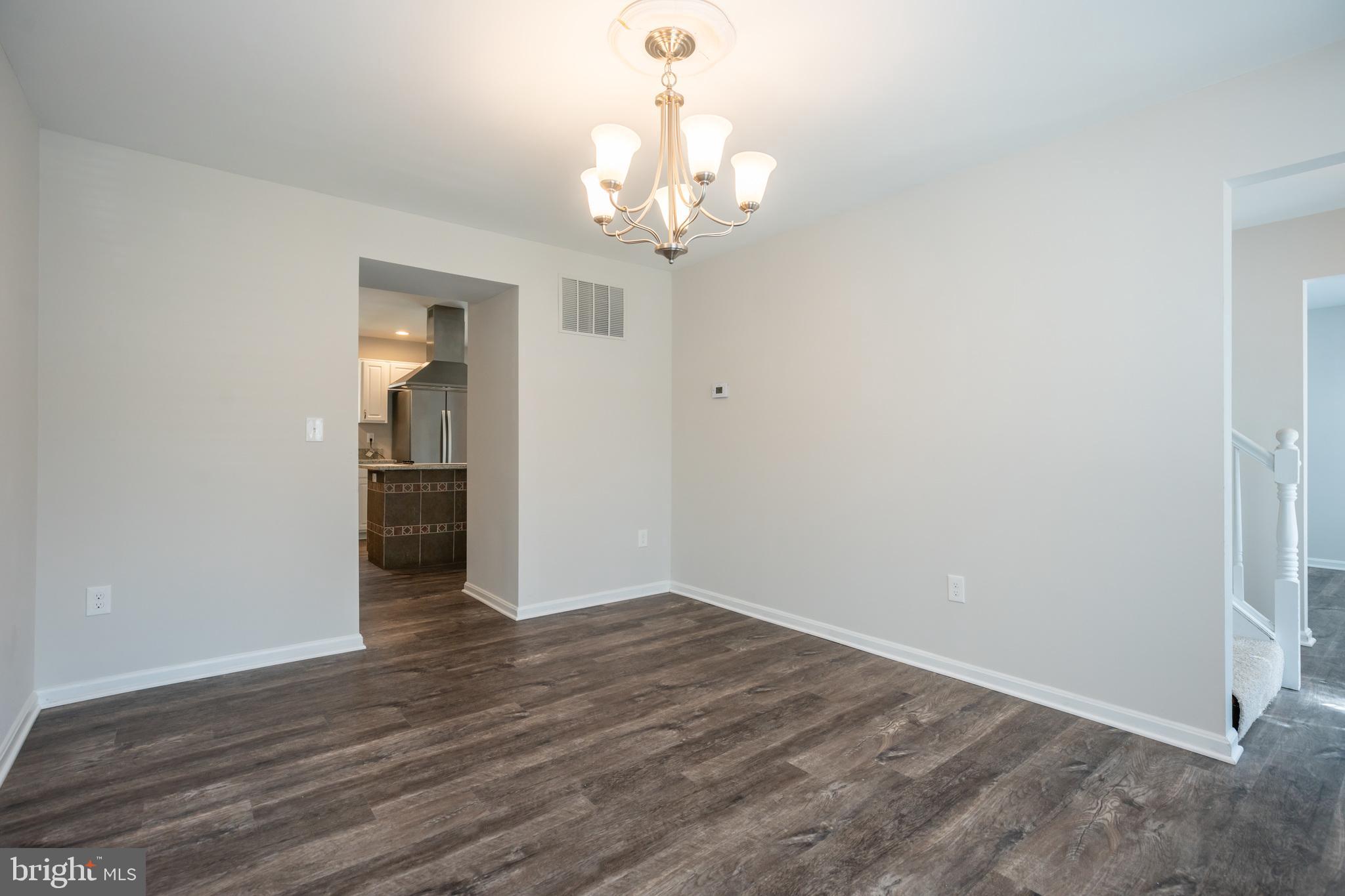 4365 Harvey Road Huntingtown, MD 20639 - Photo 10 of 36 wooden floor in an empty room