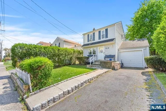 a house view with a garden space