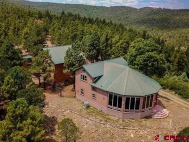 an aerial view of a house having yard