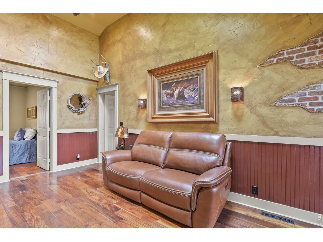 417 2nd Street Fort Lupton, CO 80621 - Photo 10 of 24 a living room with couch and a table