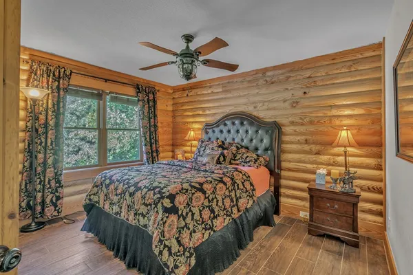 a bathroom with a toilet a sink and a mirror
