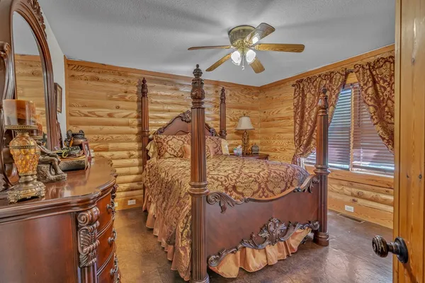 a bathroom with a sink a mirror and a shower