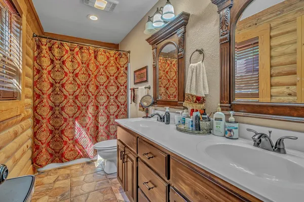 a view of a balcony with wooden floor