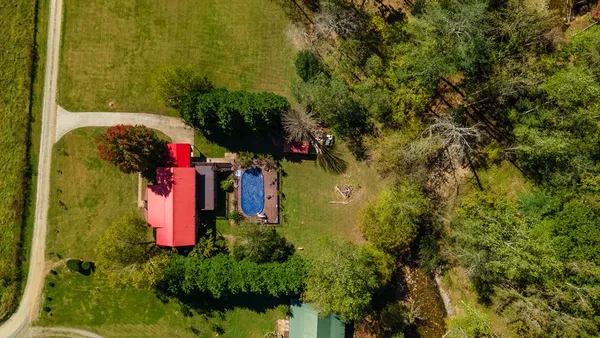 a balcony with view of the house