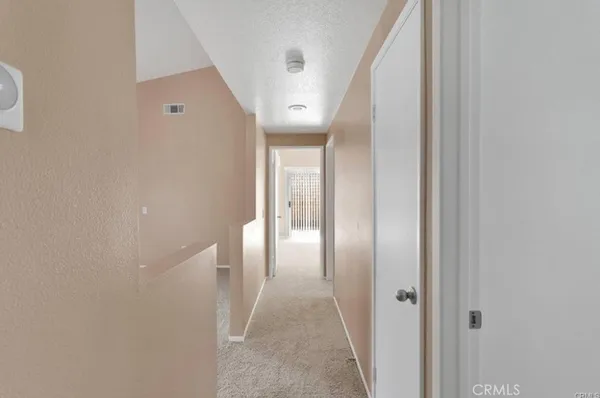 a view of hallway with stairs