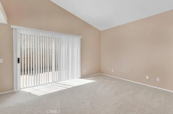 a bathroom with a double vanity sink and a toilet