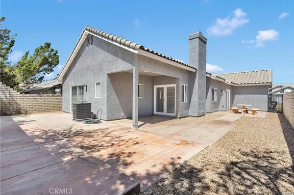 a view of a back yard of the house