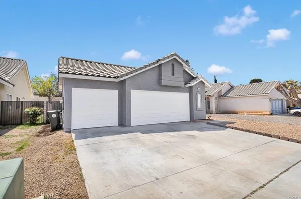 a view of a house with a patio