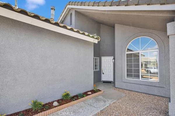 a view of front door with wooden floor