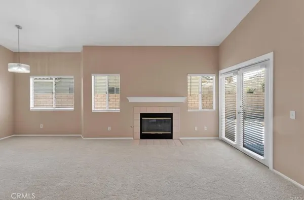 a view of livingroom with furniture and fireplace