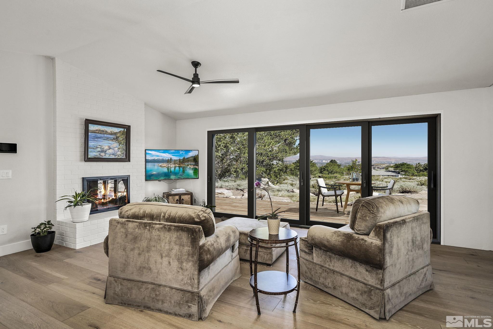 13285 Welcome Way Reno, NV 89511 - Photo 17 of 38 a living room with furniture and a large window