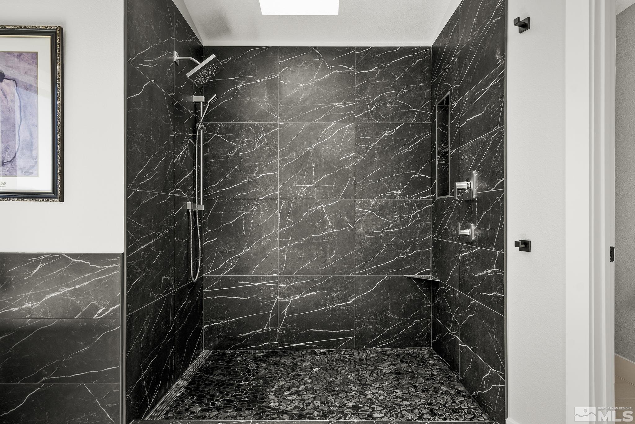 13285 Welcome Way Reno, NV 89511 - Photo 22 of 38 a bathroom with a shower