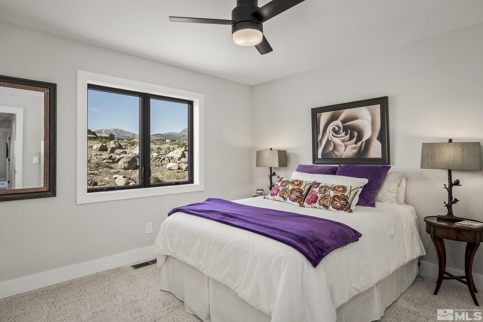 13285 Welcome Way Reno, NV 89511 - Photo 26 of 38 a bedroom with bed and a painting on the wall