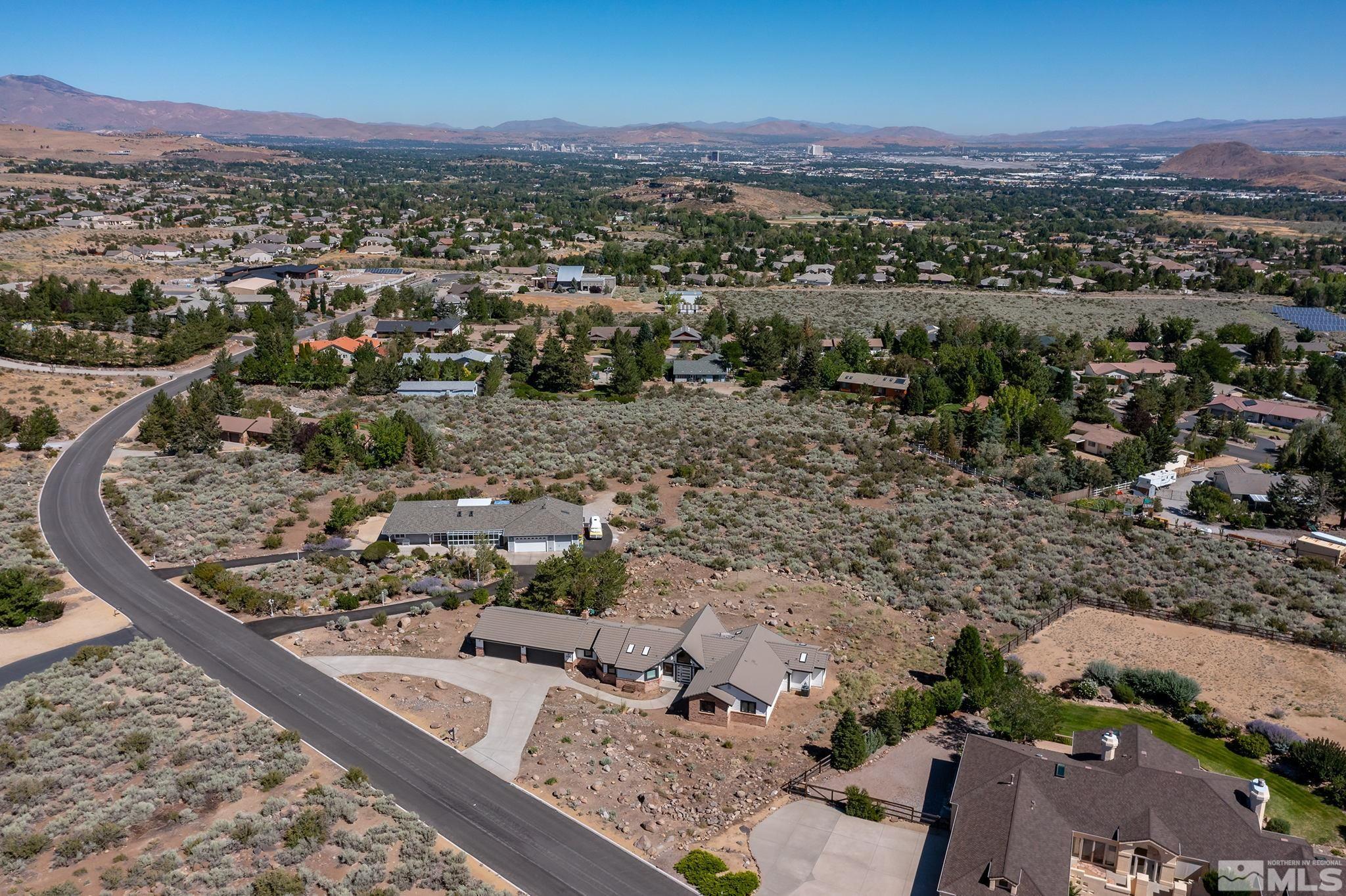 13285 Welcome Way Reno, NV 89511 - Photo 37 of 38 an aerial view of a house with a mountain