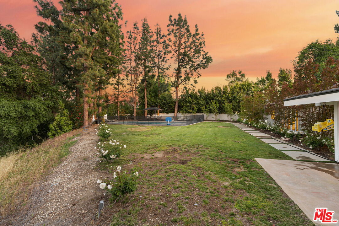 25021 Jim Bridger Road Hidden Hills, CA 91302 - Photo 24 of 30 a view of a park with large trees