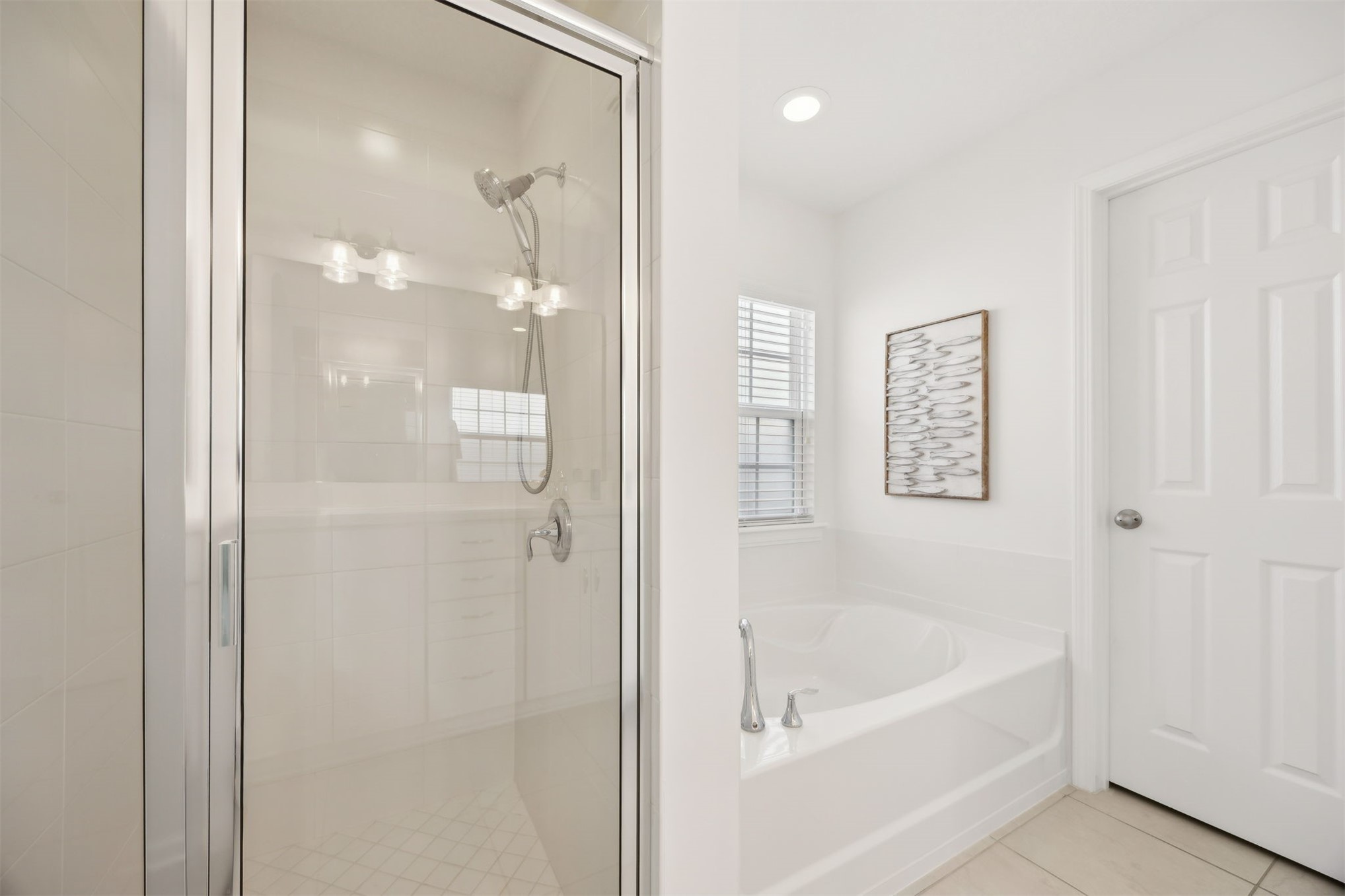 94037 Last Lane Yulee, FL 32097 - Photo 21 of 38 a bathroom with a bathtub and shower